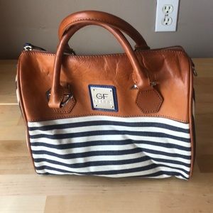 Brown leather and stripe print handbag